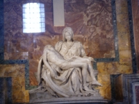 p6160020 Michelangelo's <a href=../../../rome-notes.html#pieta>Pieta</a>. <br>
Poor quality of the photograph is due to no flash use and the glass in front.